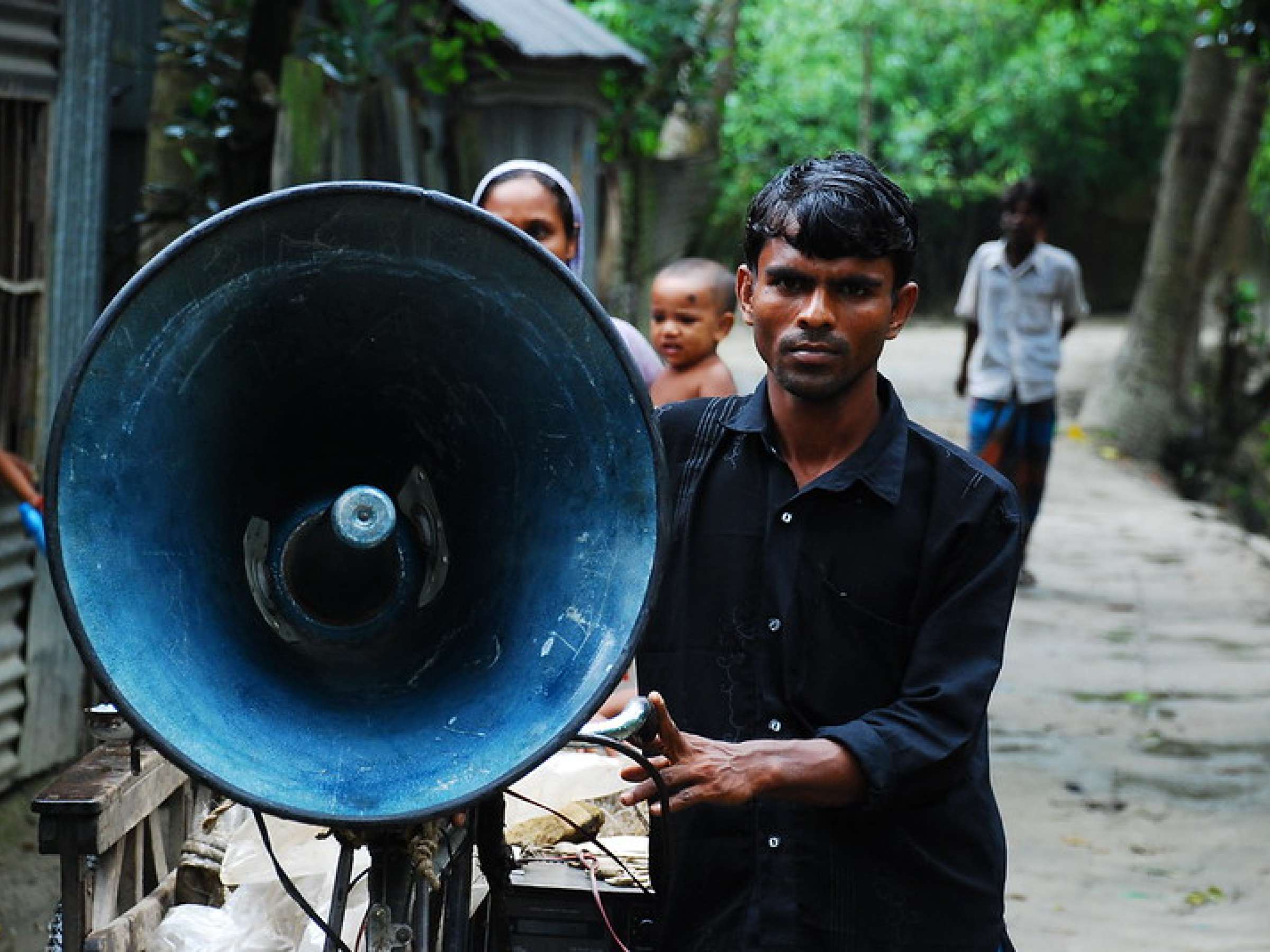 Man holding huge speaker