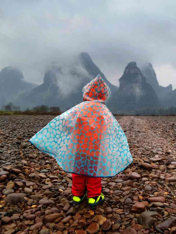 Child watching mountains