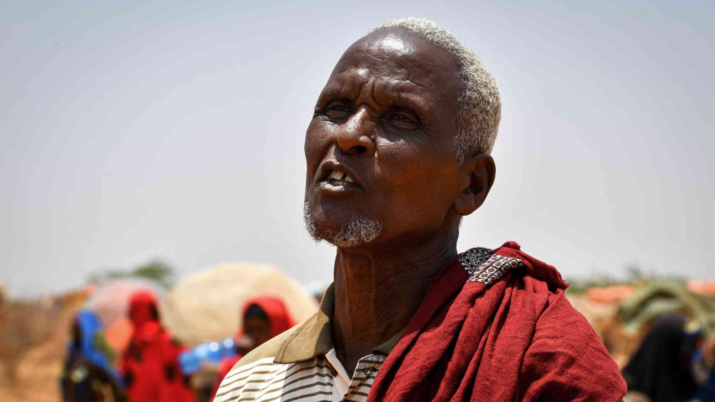 Standing in front of his makeshift home in a camp for internally displaced people (IDP) in southern Somalia’s Luuq district