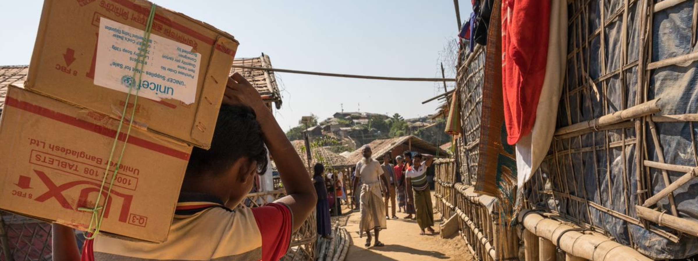 A person carries a box in Bangladesh