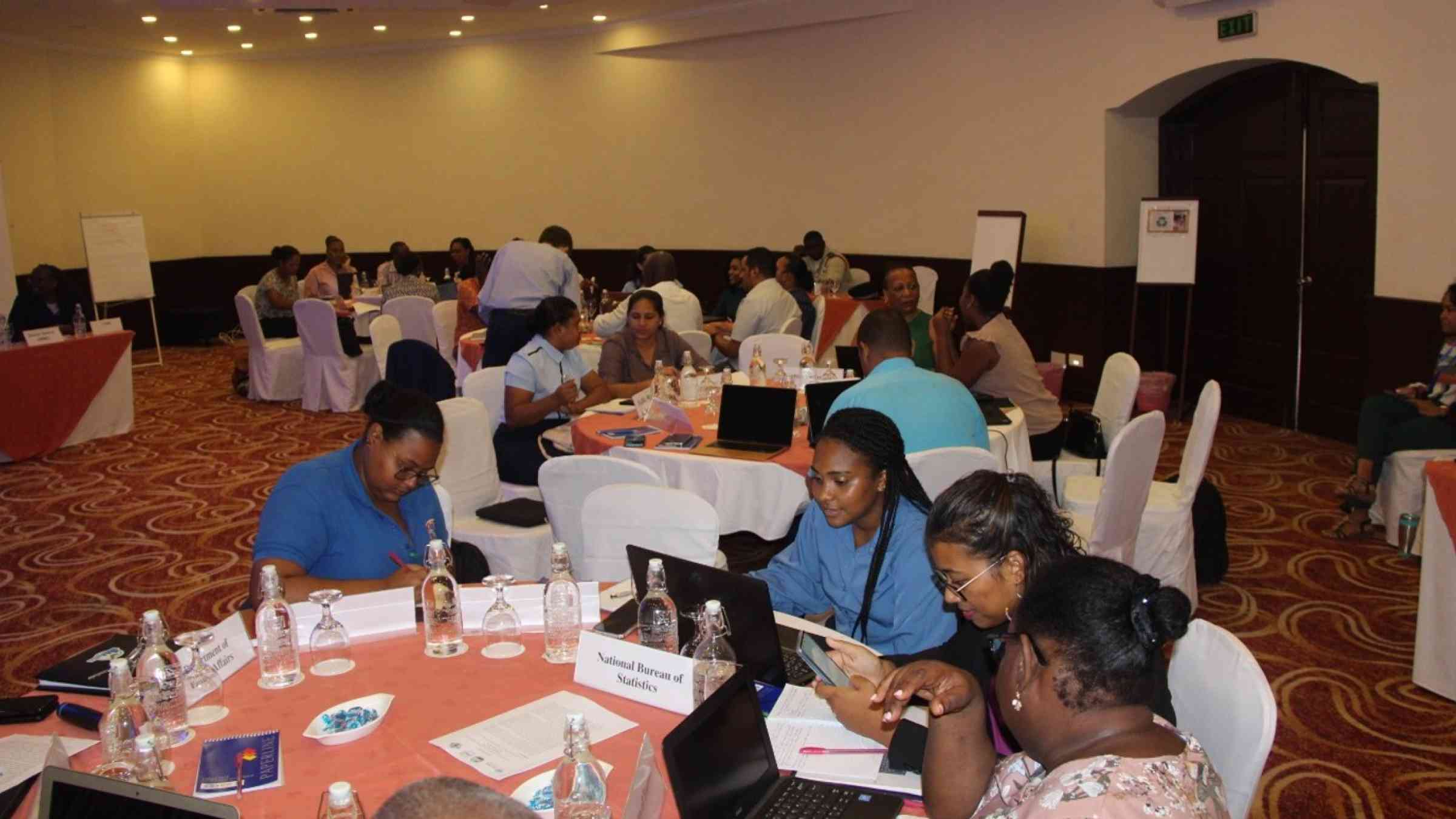 People working in groupduring a workshop.