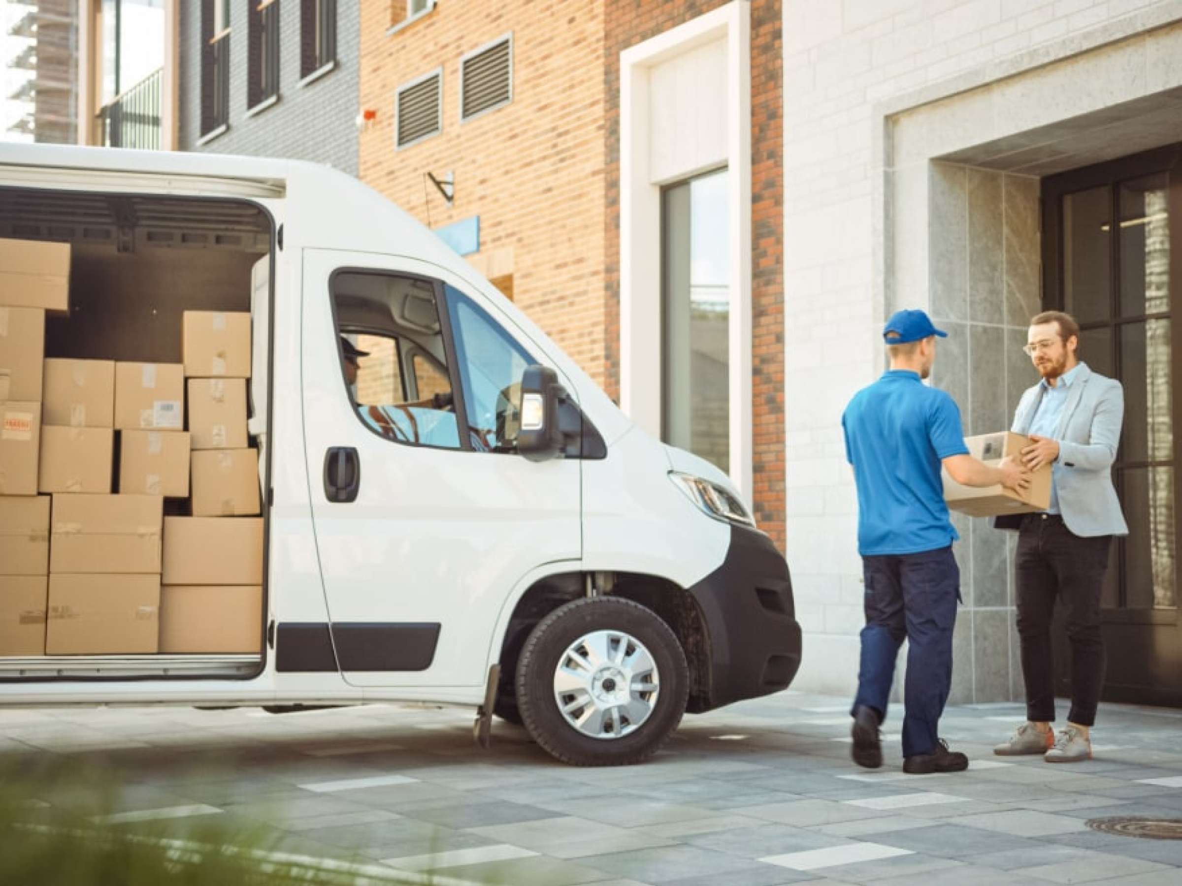 Man delivering a parcel to a client.