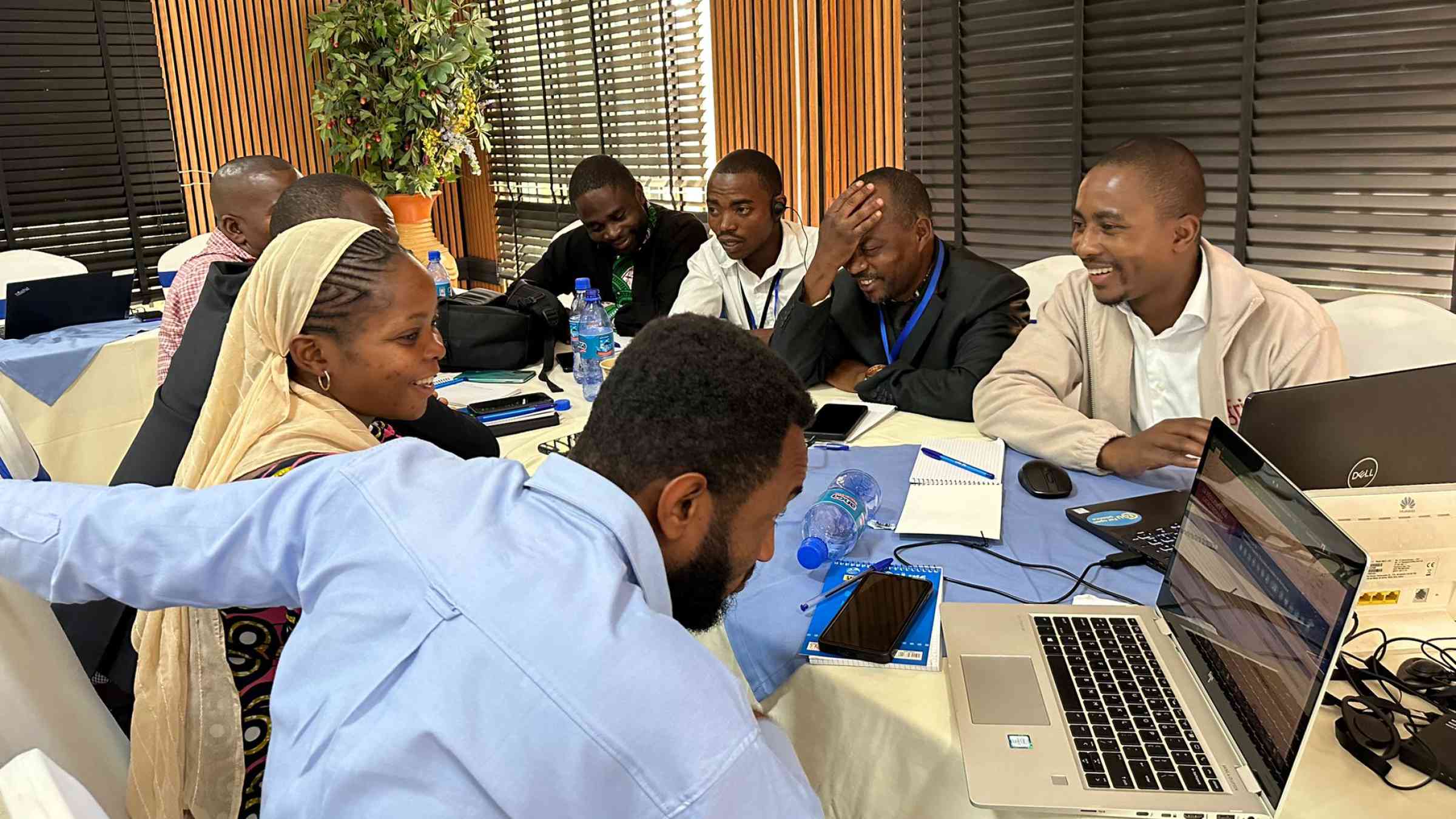 A group of participants working around a table